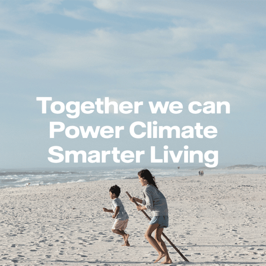 Two children on a beach and a text that says tighter we can power climate smarter living